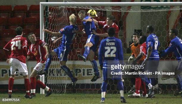 Millwall's Zak Whitbread scoring his team's third goal during the FA Cup Third Round Replay at Gresty Road, Crewe.