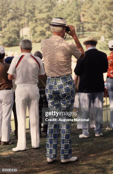 Patron watches the action through binoculars during the 1978 Masters Tournament at Augusta National Golf Club on April 1978 in Augusta, Georgia.