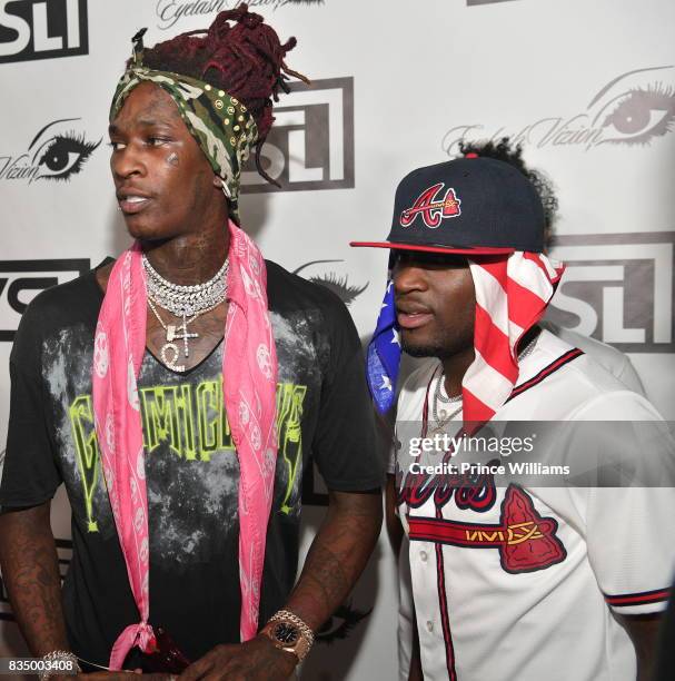 Young Thug and Ralo attend Young Thug's birthday party at Tago International on August 16, 2017 in Atlanta, Georgia.