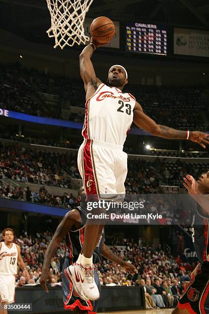 LeBron James of the Cleveland Cavaliers goes up for a dunk against the Charlotte Bobcats at The Quicken Loans Arena on October 30, 2008 in Cleveland,...