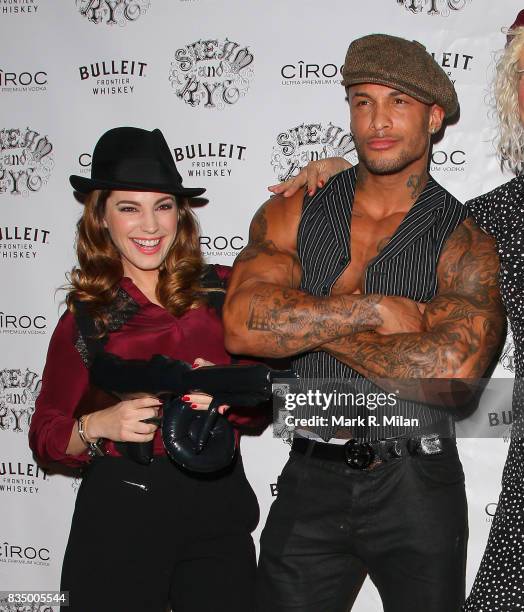 Kelly Brook and David McIntosh attend the Steam and Rye restaurant and night club on January 17, 2014 in London, England.