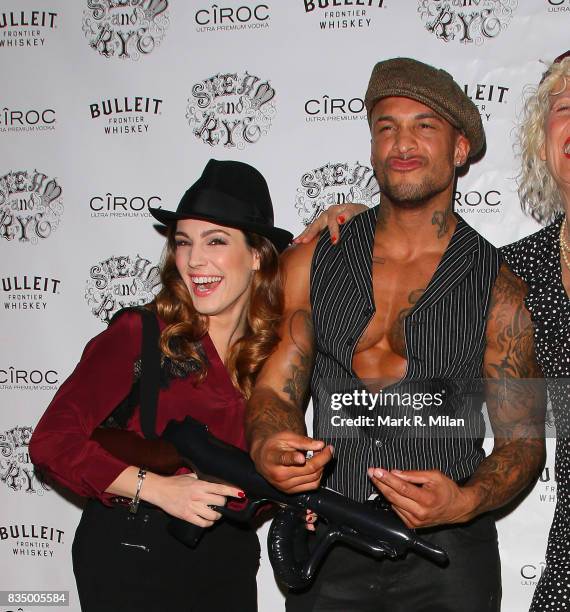 Kelly Brook and David McIntosh attend the Steam and Rye restaurant and night club on January 17, 2014 in London, England.