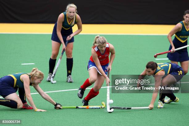 Great Britain's Sophie Bray splits the Australian defence during the Women's Hockey at the Australian Youth Olympic Festival 2009 at Sydney Olympic...