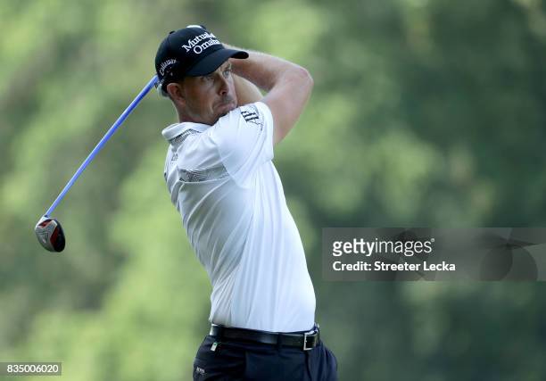 Henrik Stenson of Sweden hits a tee shot on the 15th hole during the second round of the Wyndham Championship at Sedgefield Country Club on August...