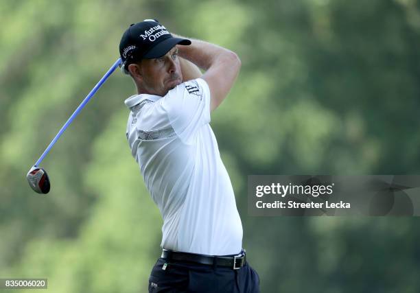 Henrik Stenson of Sweden hits a tee shot on the 15th hole during the second round of the Wyndham Championship at Sedgefield Country Club on August...