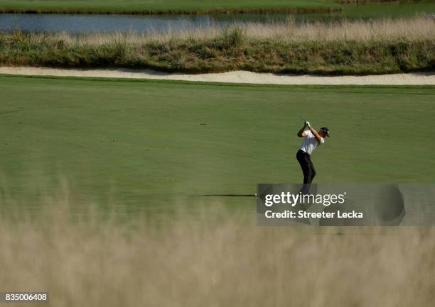 Henrik Stenson of Sweden hits a shot on the 15th hole during the second round of the Wyndham Championship at Sedgefield Country Club on August 18,...