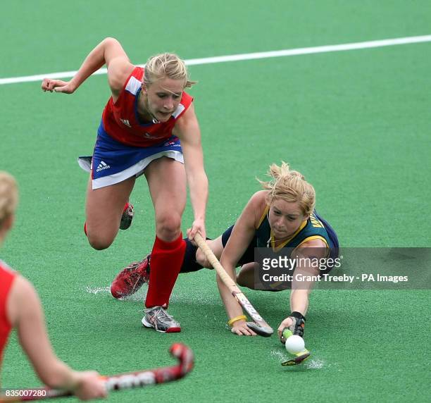 Susie Gilbert of Great Britain pushes passed a diving Emily Wilson of Australia during the Women's Hockey at the Australian Youth Olympic Festival...