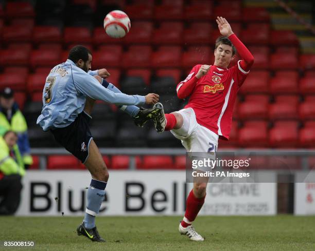 Scunthorpe United's Marcus Williams and Crewe Alexendra's Luke Murphy during the Coca-Cola Football League One match at the Alexandra Stadium, Crewe.