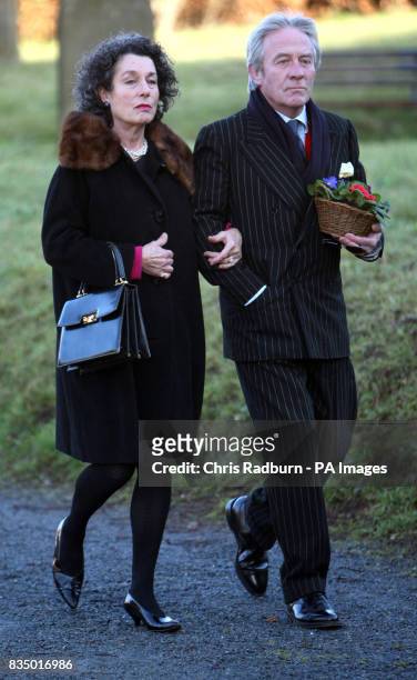 Roddy Llewellyn, brother of Sir Dai Llewellyn, and wife Tatiana arrive at St Marys Church, for his brothers funeral, Coddenham, Suffolk.