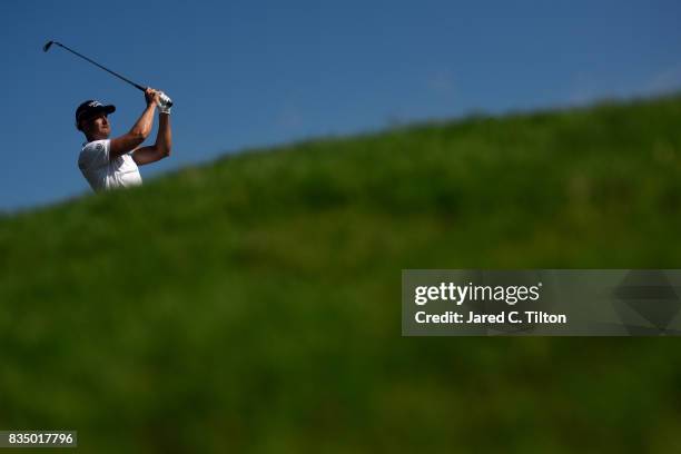 Henrik Stenson of Sweden plays his tee shot on the 16th hole during the second round of the Wyndham Championship at Sedgefield Country Club on August...