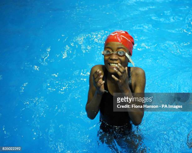 Child from Lambeth Borough, London, during a swimming lesson in a 0.9 metre temporary mobile swimming pool. The scheme offers free tuition to inner...