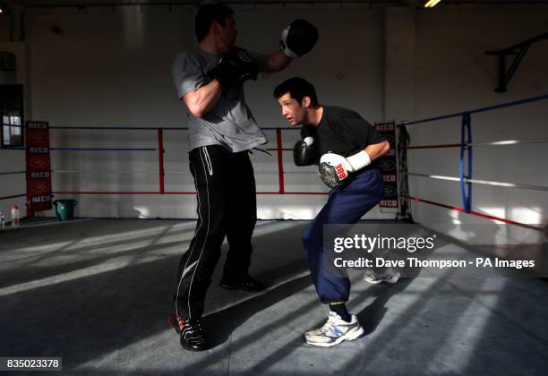Boxer Steve Bell during a training session with trainer Anthony Farnell at Arnies Gym, Manchester.