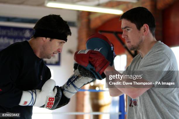 Boxer Steve Bell during a training session with trainer Anthony Farnell at Arnies Gym, Manchester.