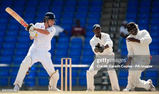 England's Alastair Cook hits out during the tour match at Warren Park Cricket Ground, St Kitts.