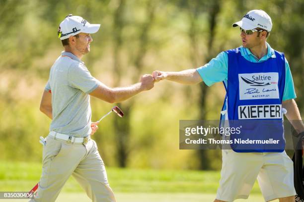 Maximilian Kiefer of Germany and his caddie are seen during day two of the Saltire Energy Paul Lawrie Matchplay at Golf Resort Bad Griesbach on...
