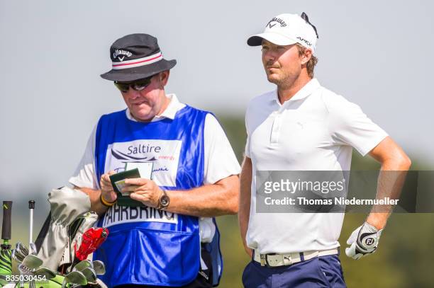 Jens Fahrbring of Sweden and his caddie are seen during day two of the Saltire Energy Paul Lawrie Matchplay at Golf Resort Bad Griesbach on August...