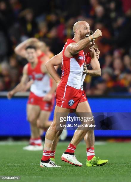 Tom Papley and Jarrad McVeigh of the Swans celebrate the final siren during the round 22 AFL match between the Adelaide Crows and the Sydney Swans at...