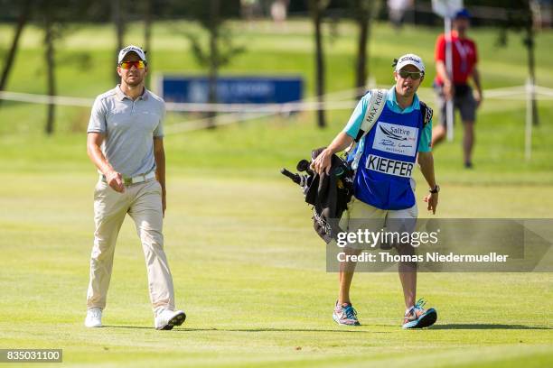 Maximilian Kiefer of Germany and his caddie are seen during day two of the Saltire Energy Paul Lawrie Matchplay at Golf Resort Bad Griesbach on...