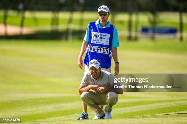 Maximilian Kiefer of Germany and his caddie are seen during day two of the Saltire Energy Paul Lawrie Matchplay at Golf Resort Bad Griesbach on...