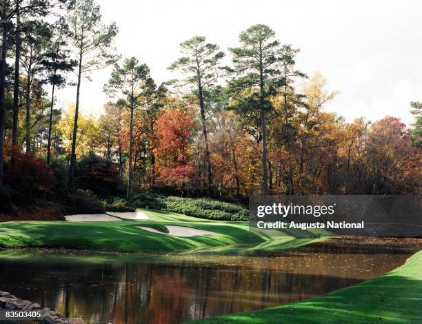 On course view of the 12th green with the Byron Nelson Bridge in the background in the Fall season at the Augusta National Golf Club in Augusta,...