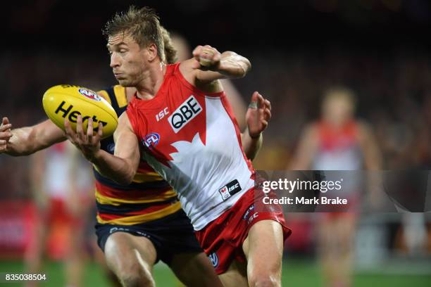 Rory Sloane of the Crows Kieren Jack of the Swans competes during the round 22 AFL match between the Adelaide Crows and the Sydney Swans at Adelaide...