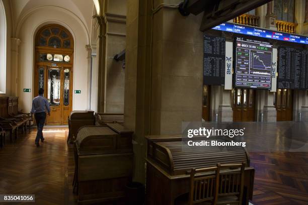 Stock index curve sits on an electronic screen inside the Madrid stock exchange, also known as Bolsas y Mercados Espanoles, the day after the...