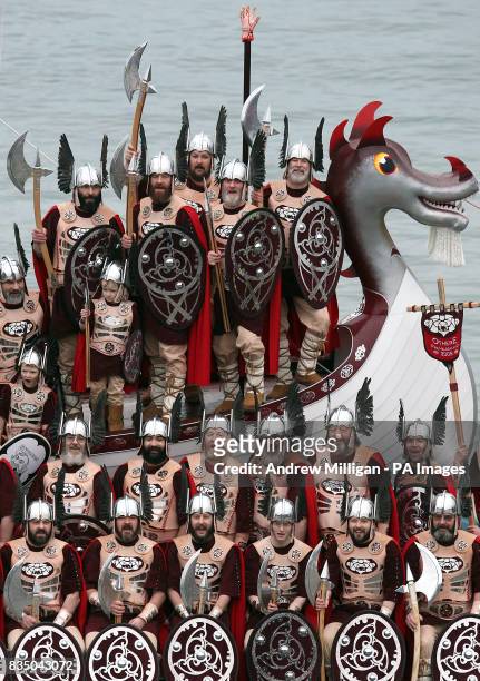 Viking takes part in the Up Helly Aa festival in Lerwick on the Shetland Isles. The "Jarl Squad" dressed in viking costume pose for a photograph with...