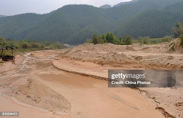 Mud river caused by over-exploitation of ceramic earth is seen at the Yuantan Township, since many ceramics companies was shifted from China's...