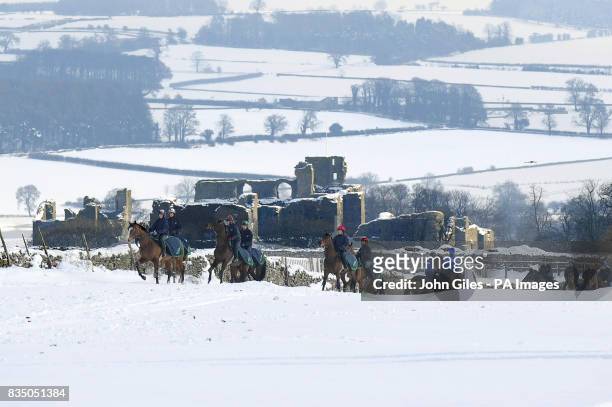 With turf racing again abandoned in the UK because of heavy snowfalls the gallops at Middleham in North Yorkshire were busy with racehorses...