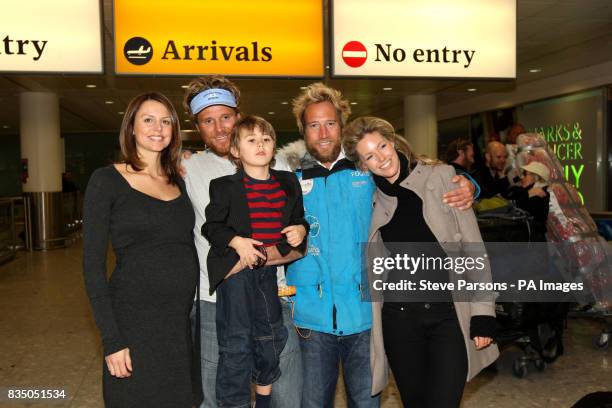 James Cracknell is met by wife Beverley and son Croyde, 5 and Ben Fogle is met by wife Marina at Heathrow Airport, Terminal 3, after their return...