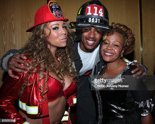 Mariah Carey, Nick Cannon and his mother attend a Halloween party at Marquee on October 30, 2008 in New York City.