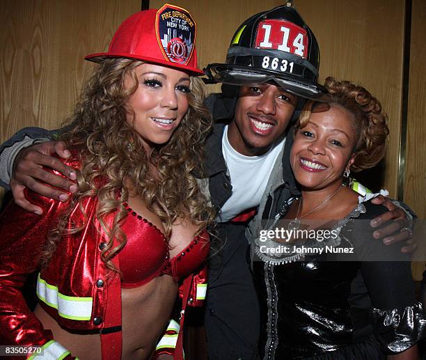 Mariah Carey, Nick Cannon and his mother attend a Halloween party at Marquee on October 30, 2008 in New York City.