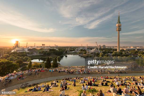 skyline at sunset - olympiapark stock pictures, royalty-free photos & images