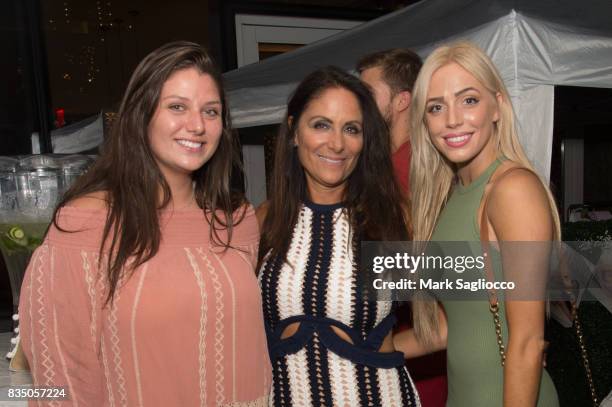 Mackenzie Meekins, Lynn Scotti and Alexandra Cooper attend the Gotham "Summer Sundown" at Life Time Athletic at Sky Life Time Athletic at Sky on...