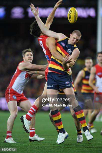 Sam Jacobs of the Crows and Kurt Tippett of the Swans competes during the round 22 AFL match between the Adelaide Crows and the Sydney Swans at...