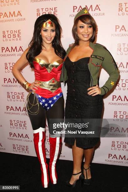 Kim Kardashian and Cheryl Burke attend Kim and PAMA's Halloween Masquerade at the Stone Rose on October 30, 2008 in Los Angeles, California.