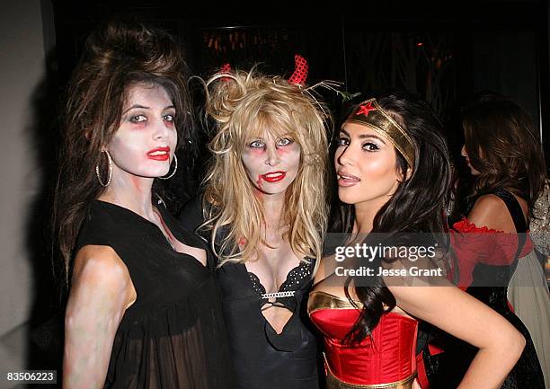 Brittny Gastineau, Lisa Gastineau and Kim Kardashian attend Kim Kardashian's Halloween party hosted by PAMA at Stone Rose on October 30, 2008 in Los...