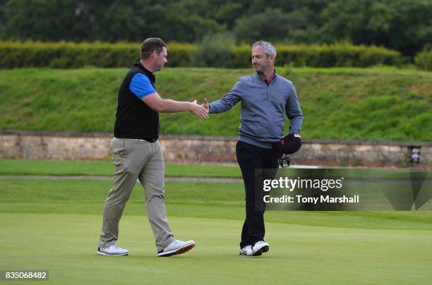 Martyn Jobling of Morpeth Golf Club and David Clark of Morpeth Golf Club celebrate winning the Golfbreaks.com PGA Fourball Championship on the 18th...