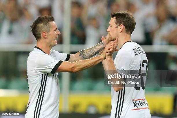 Krzysztof Maczynski , Kasper Hamalainen celebrate a score goal during match UEFA Europa League play-off, Legia Warsaw and FC Sheriff Tiraspol in...