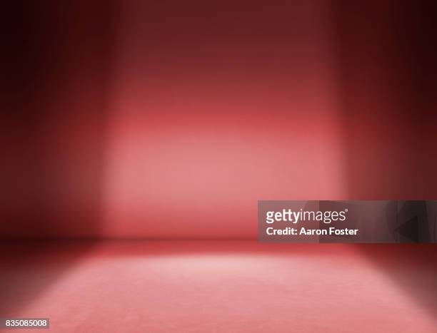 empty photography studio. - red background stock pictures, royalty-free photos & images
