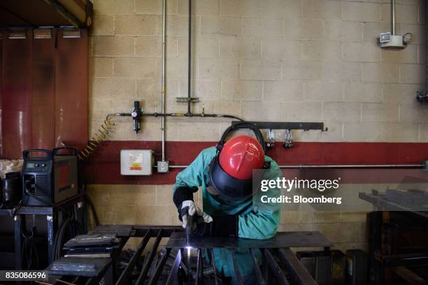 Student practices plasma cutting during a class at the Penn Commercial Business/Technical School in Washington, Pennsylvania, U.S., on Tuesday, Aug....