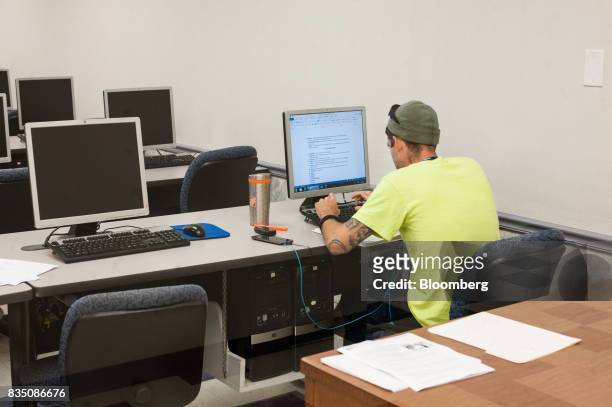 Student works on a computer in the Resource Learning Center at Penn Commercial Business/Technical School in Washington, Pennsylvania, U.S., on...