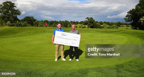 Martyn Jobling of Morpeth Golf Club and David Clark of Morpeth Golf Club winners of the Golfbreaks.com PGA Fourball Championship pose with the...