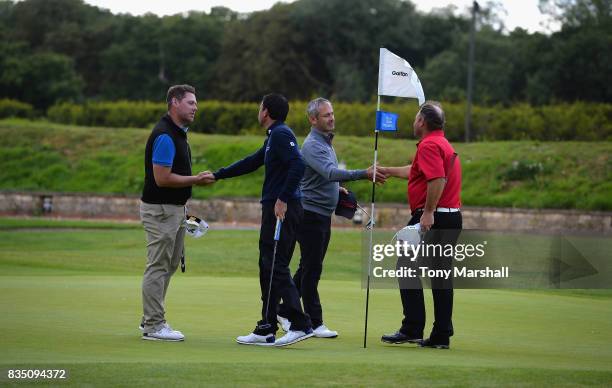 Martyn Jobling of Morpeth Golf Club and David Clark of Morpeth Golf Club winners of the Golfbreaks.com PGA Fourball Championship shake hands with...