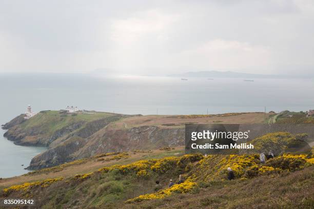 Howth cliff path overlooking Dublin Bay and Howth Lighthouse on 09th April 2017 in County Dublin, Republic of Ireland. Howarth Cliff Path, at Howth...