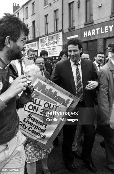 Liverpool's Deputy Council Leader, Mr Derek Hatton and his colleague Mr Tony Mulhearne at the head of a march through the centre of Liverpool today.