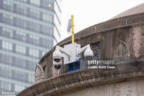 Temporarily installed surveillance cameras atop of the Boston Common Bandstand where a "Free Speech" rally is scheduled and a large rally against...