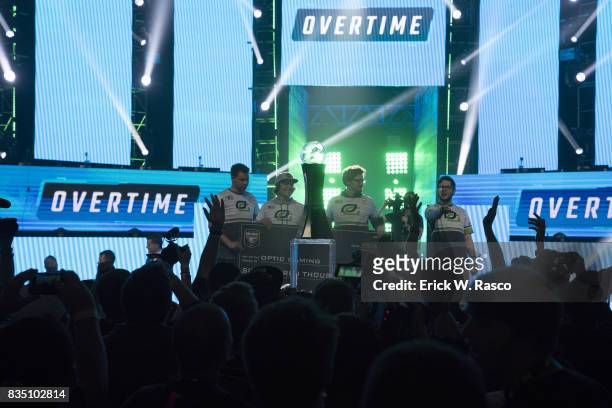 Call of Duty World League Championship: Overall view of Optic Gaming team victorious with oversized check after winning Grand Final round vs Team...