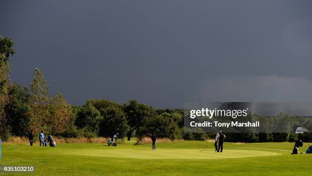 View of the 16th green with a dark sky during the Golfbreaks.com PGA Fourball Championship - Day 3 at Whittlebury Park Golf & Country Club on August...