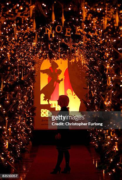 Visitor views one of the life-size silhouette tableaux that adorn the Chatsworth stately home on October 31 Chatsworth, England. The cutouts by...